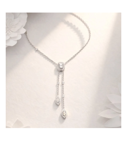 Arihantas white diamond lariat necklace on a soft ivory background